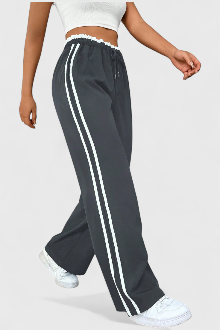 Alanys Pantalón Deportivo de Pierna Ancha con Detalle Lateral.