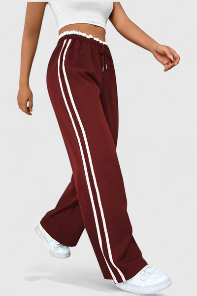 Alanys Pantalón Deportivo de Pierna Ancha con Detalle Lateral.