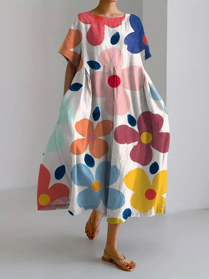 VALENTINA | Robe d'été fleurie avec coupe flatteuse et liberté de mouvement.