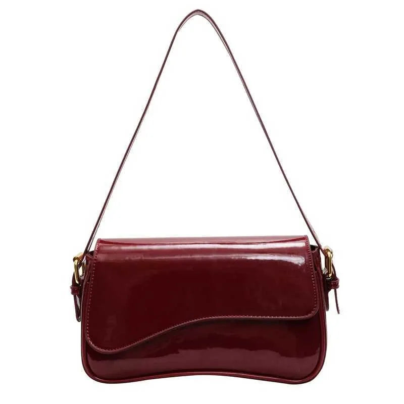 Saddie™ LEATHER BAG.