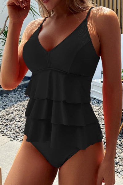 Tankini con abertura y volantes de color sólido.