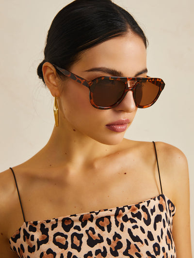 NOVA - Sonnenbrille mit Leopardenmuster.
