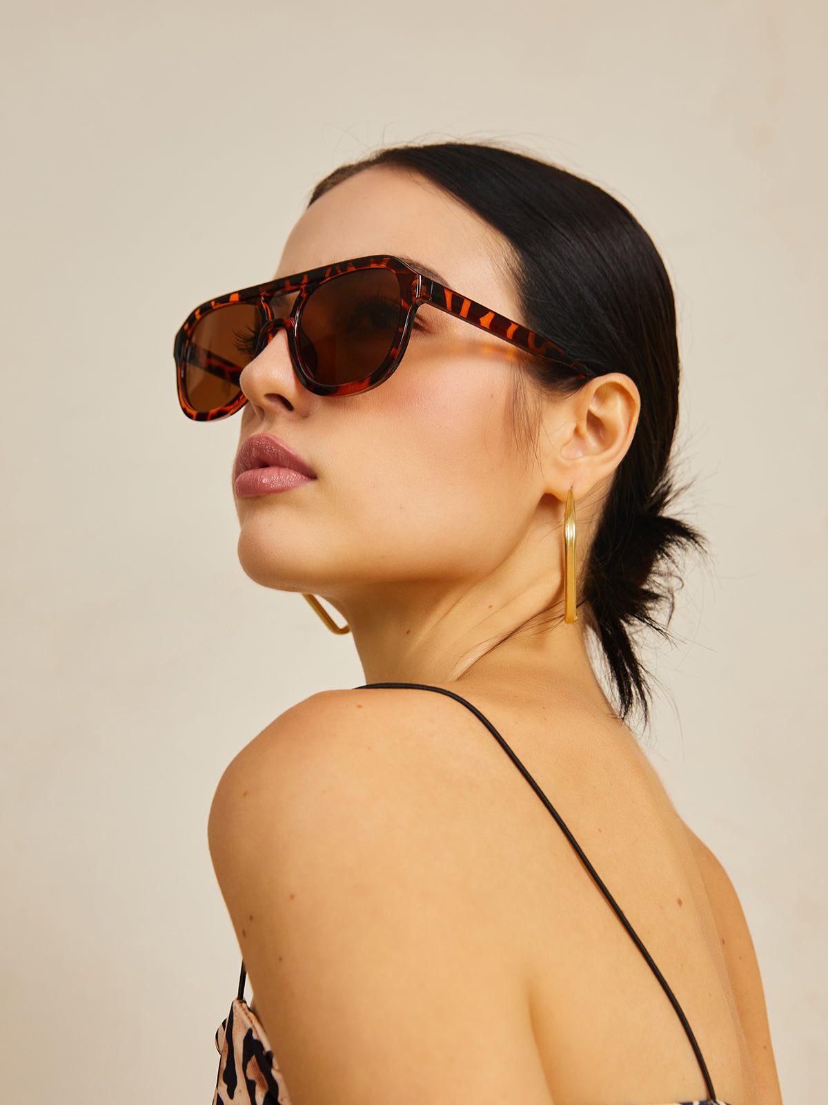 NOVA - Sonnenbrille mit Leopardenmuster.