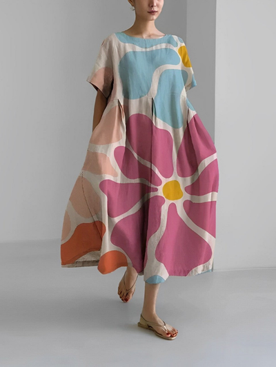 VALENTINA | Robe d'été fleurie avec coupe flatteuse et liberté de mouvement.