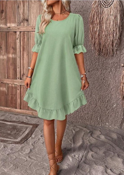 Elisa | Vestido midi atemporal.