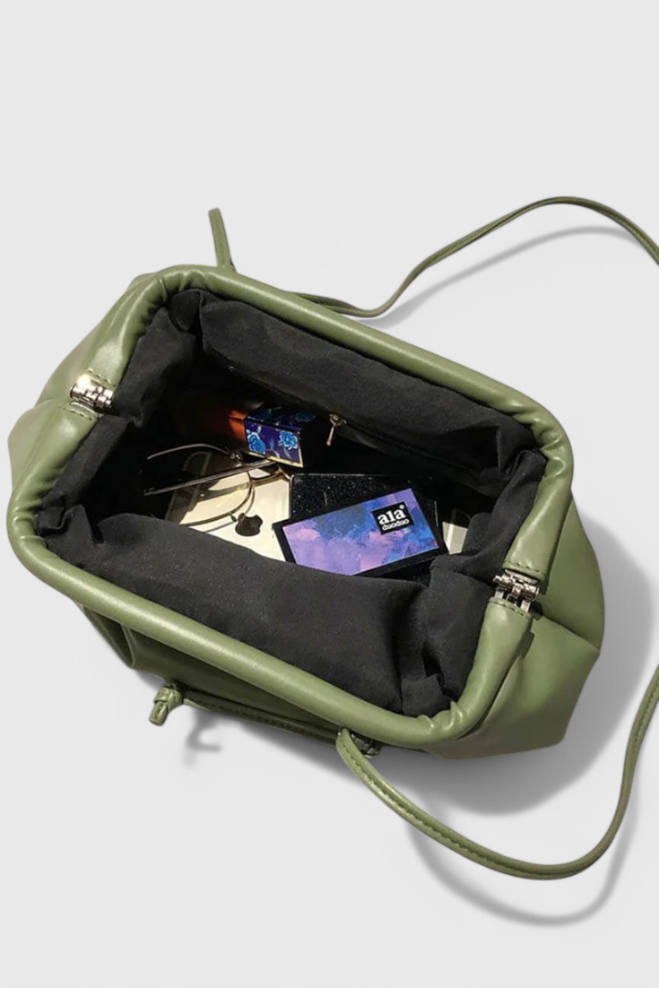 Dalila Bolso Cruzado.