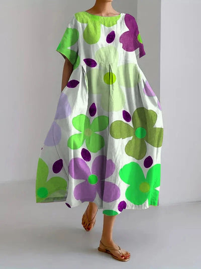 VALENTINA | Robe d'été fleurie avec coupe flatteuse et liberté de mouvement.