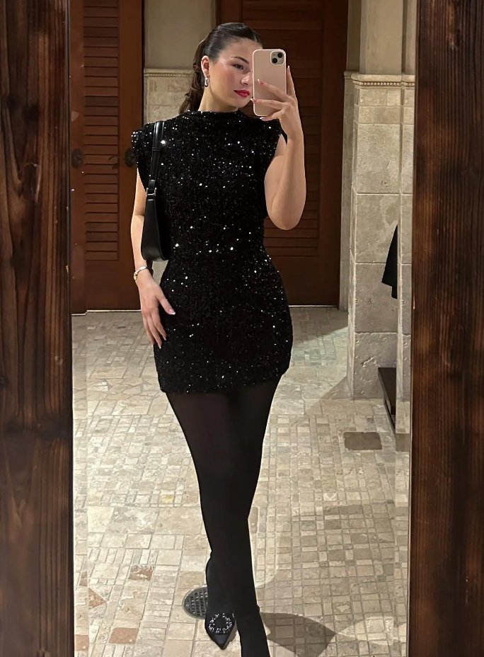 El glamoroso vestido de lentejuelas de Livia.